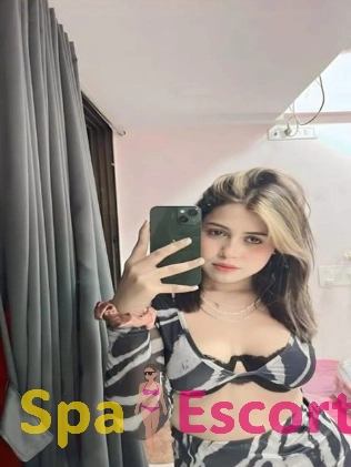 High-class escort wearing lingerie for exclusive night service.